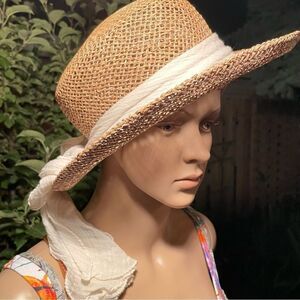 Straw hat with white sash